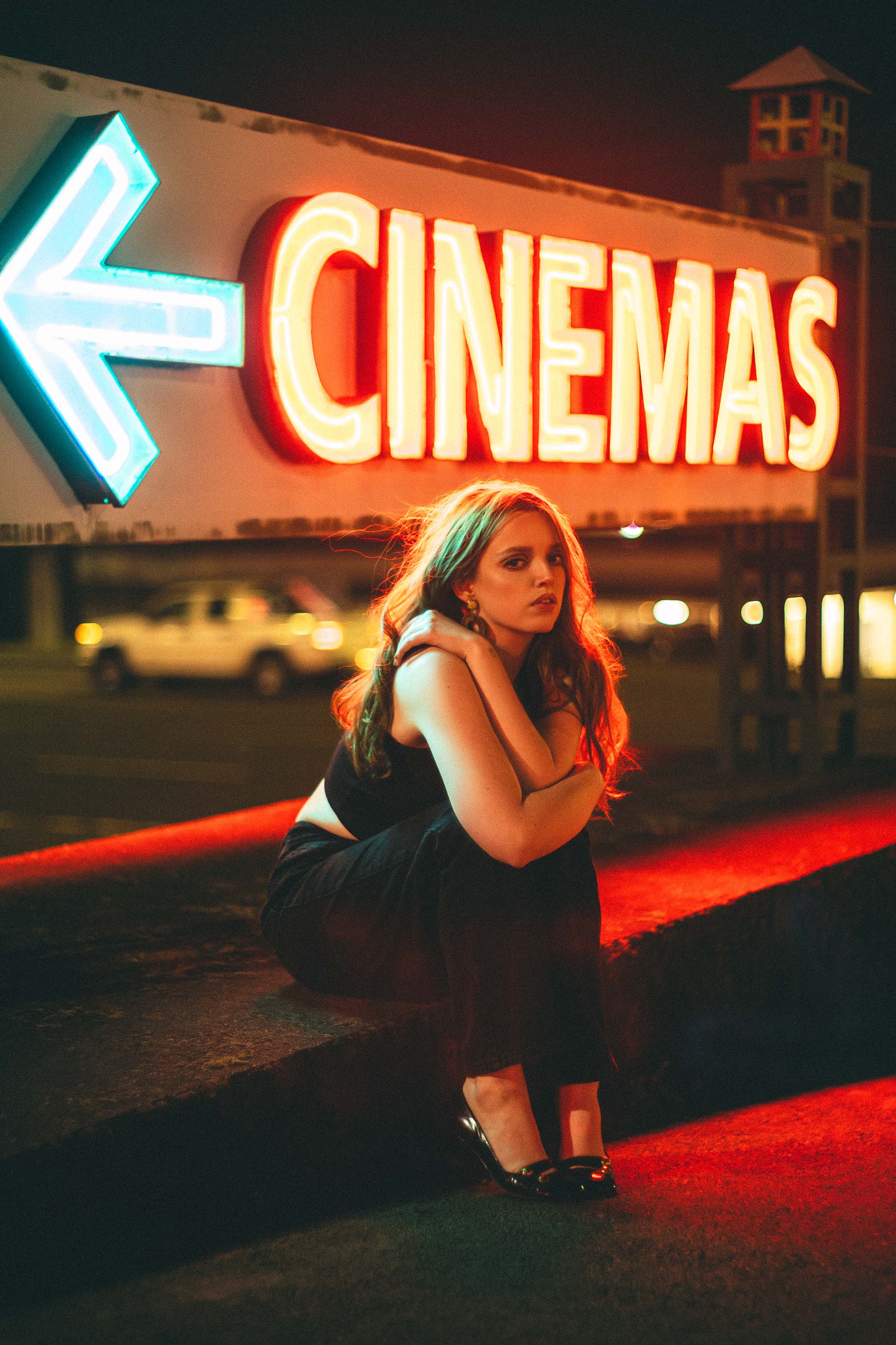 Cinematic Portraits with Vintage Flair by a Movie Theater — photograph 34 of 35